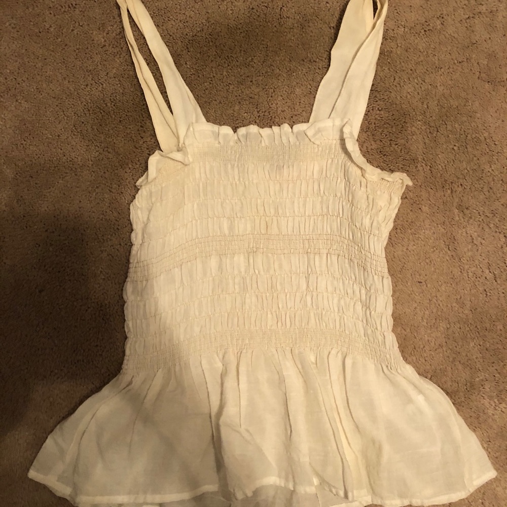 Women’s fitted white tank with thin straps